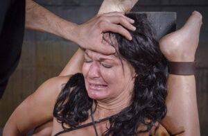 Brunette female London River is totally helpless during an intense BDSM fuck on nudepicso.com