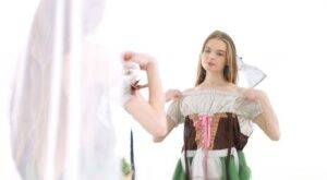 Young beauty Adel Bye dresses in an Oktoberfest outfit to greet her boyfriend on nudepicso.com