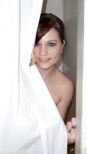 Sweet european amateur posing for a homemade photo in the shower on nudepicso.com