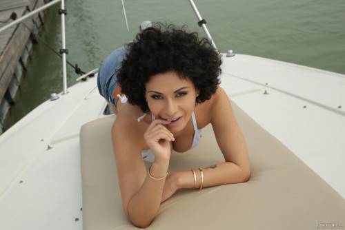 Curly-haired Beauty With Big Natural Tits Gets Sodomized On Yacht on nudepicso.com
