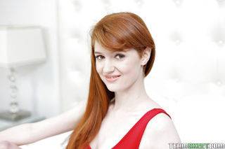 Young redhead amateur abbey rain displays her delicious pale body on nudepicso.com