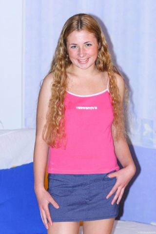 Curly haired blonde teen angel pleasing her pink pussy hard on nudepicso.com