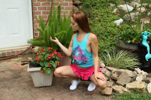 Hot redhead teen Kymberly Brix in sexy skirt exhibits tiny tits and toys her cunt outdoor on nudepicso.com