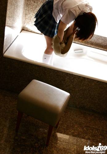 Stunning japanese teen Hina Tachibana exposes big tits and hot butt in the bathroom - Japan on nudepicso.com