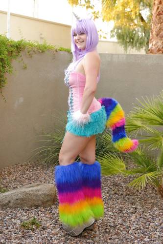 Excellent hottie Danielle Delaunay in cosplay costume baring big hooters and toying her pussy outdoor on nudepicso.com