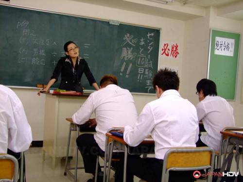 Kinky Teacher In Uniform Yui Komine Is Doing Blowjob Over Studentâ€™s Piston on nudepicso.com
