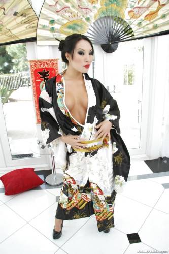 Lovely japanese babe Asa Akira revealing big boobs and spreading her legs - Japan on nudepicso.com
