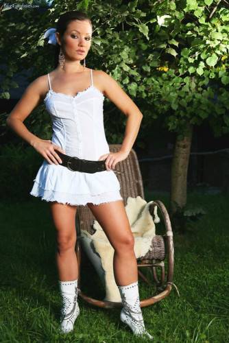 Brunette Jana Mrazkova Strips Her Garments In The Garden And Masturbates Wearing Only Leather Belt. on nudepicso.com