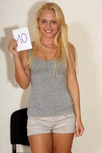 Passionate And Alluring Blonde Vanda Lust Poses Naked On The Chair During Casting on nudepicso.com