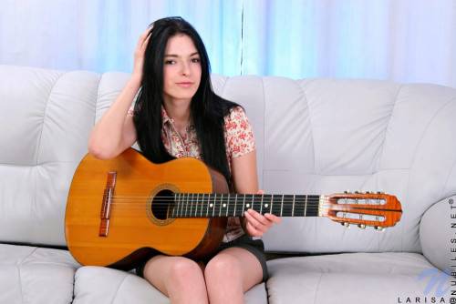 Sweet Brunette In Socks Larisa Nubiles Plays The Guitar And Toys Her Juicy Pussy on nudepicso.com