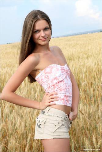 Elena May Got Out To The Wheat Field And Undressing There To Demonstrate Her Slender Body And Its Beauties on nudepicso.com