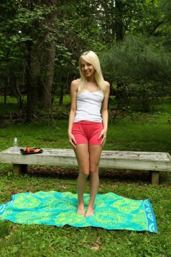 Blonde Teenager Sierra Nevadah Sets On The Green Lawn And Dildo Fucks The Beaver on nudepicso.com