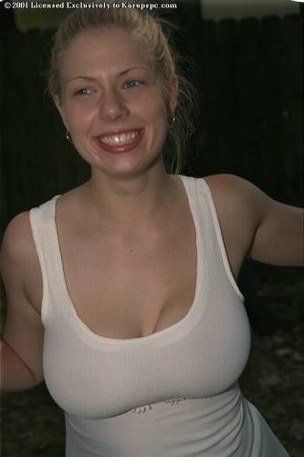Slender youthful Christy in hot panties exposes big knockers and hot butt outdoor on nudepicso.com