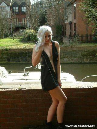 Cute blonde, miss chaos, strips off beside a busy river way - Britain on nudepicso.com