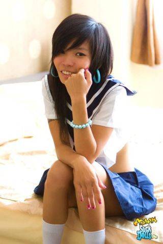 Puy is dressed like a sailor girl and needs a cock to ride on - Thailand on nudepicso.com