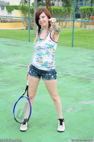 Heavy Chested Pale Brunette Ivy Jean Exposes Her Tattoos On The Tennis Court on nudepicso.com