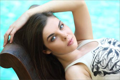 Beautiful Young Brunette Dakota A Is Undressing By The Pool And Hotly Bending Her Sexy Shaped Body on nudepicso.com