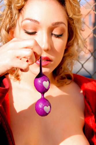 Lily Luvs In Long Red Coat Plays With Purple Vagina Balls In Public Place on nudepicso.com
