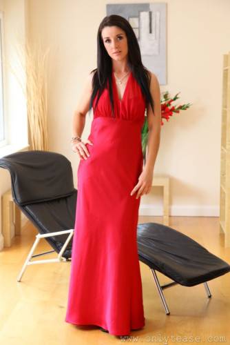 Elegant Sarah B In Black Stockings Pulls Off Her Long Red Dress And Displays Her Boobs on nudepicso.com