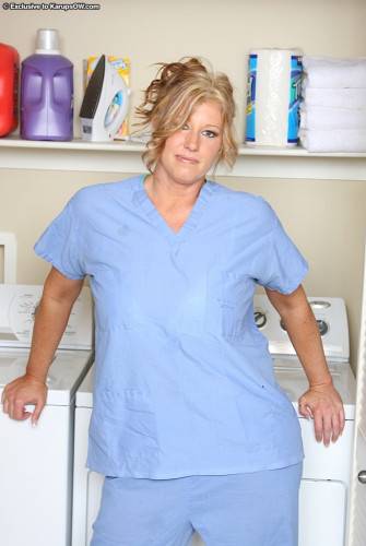 Breasty Milf Nurse Zoey Andrews Removes Her Blue Uniform And White Underwear on nudepicso.com