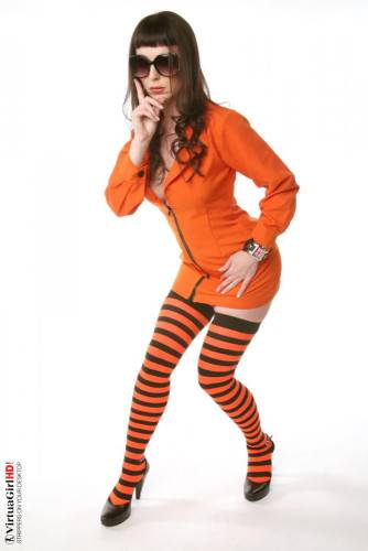 Frisky Babe Jennifer Galbina Ripping Off Her Uniform And Posing In Nothing But Striped Stockings on nudepicso.com