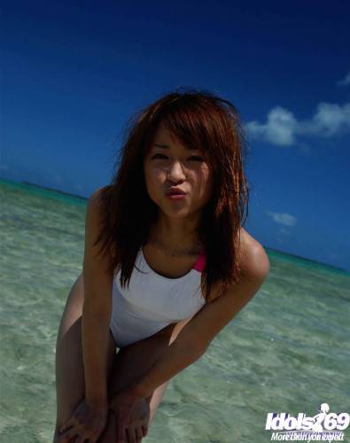 Slender japanese young Asuka Kyono in hot bikini shows small tits and hot ass at beach - Japan on nudepicso.com