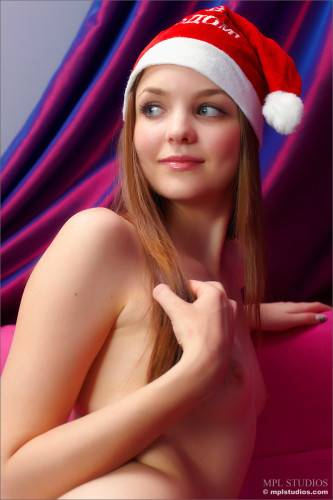 Dirty Girl Amelie Femjoy Enjoys In Playing A Sexy Santa Girl On The Couch on nudepicso.com