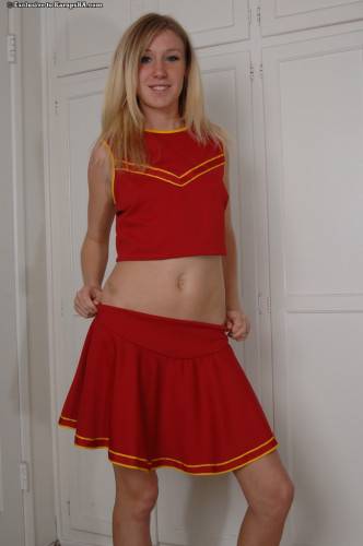 Blonde Allison Pierce In Red Cheerleader Uniform And White Panties Toys Her Pussy on nudepicso.com